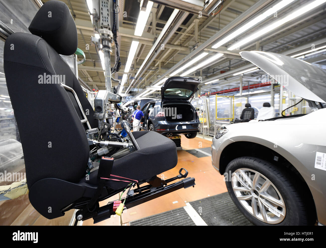 Volkswagen Golf cars are seen in a production line at the companies headquarter in Wolfsburg, March 9, 2017. VW Golf, Golfs in der Produktionslinie im Stock Photo