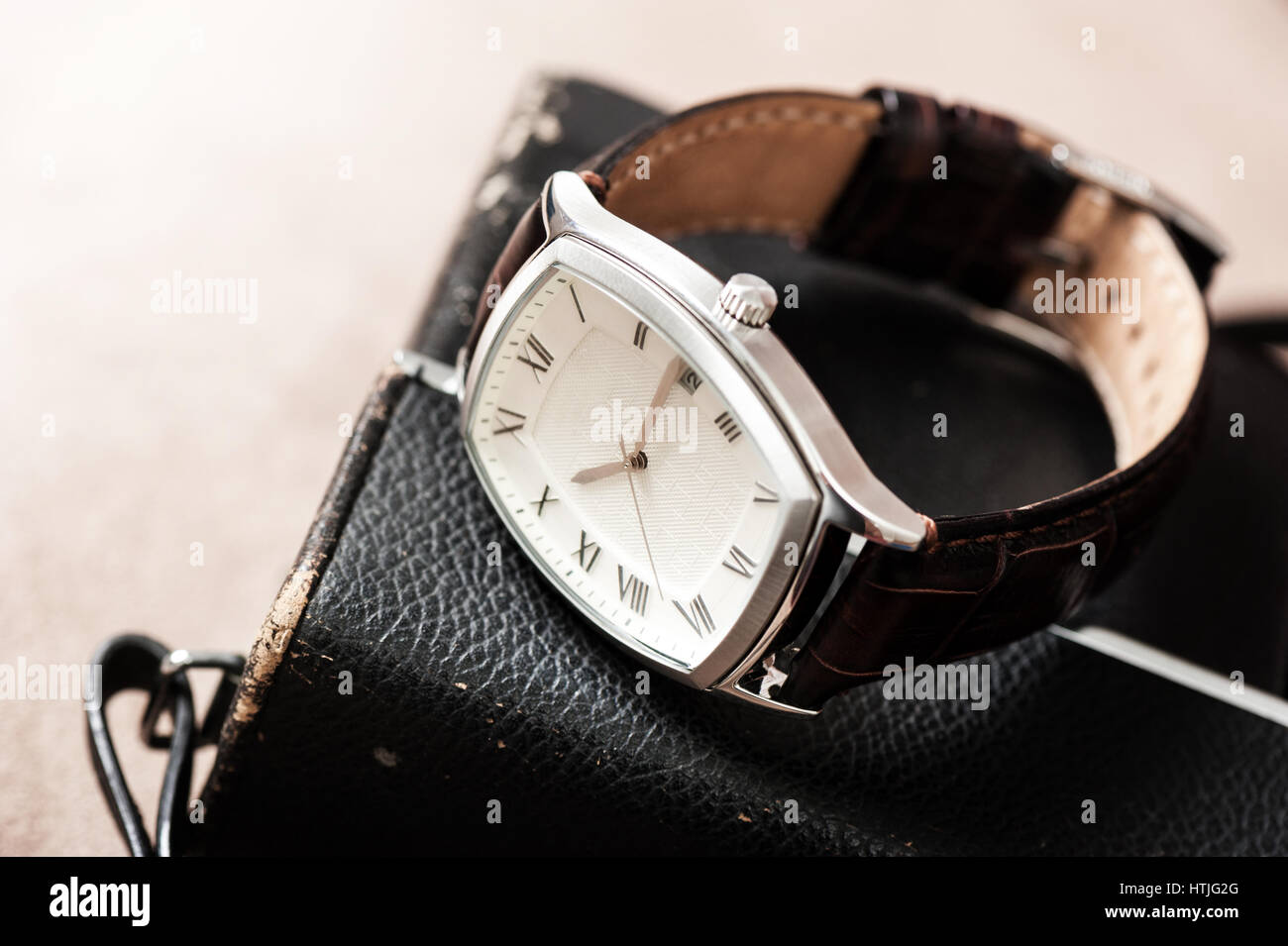 vintage style of luxury men watch with stainless case and leather strap