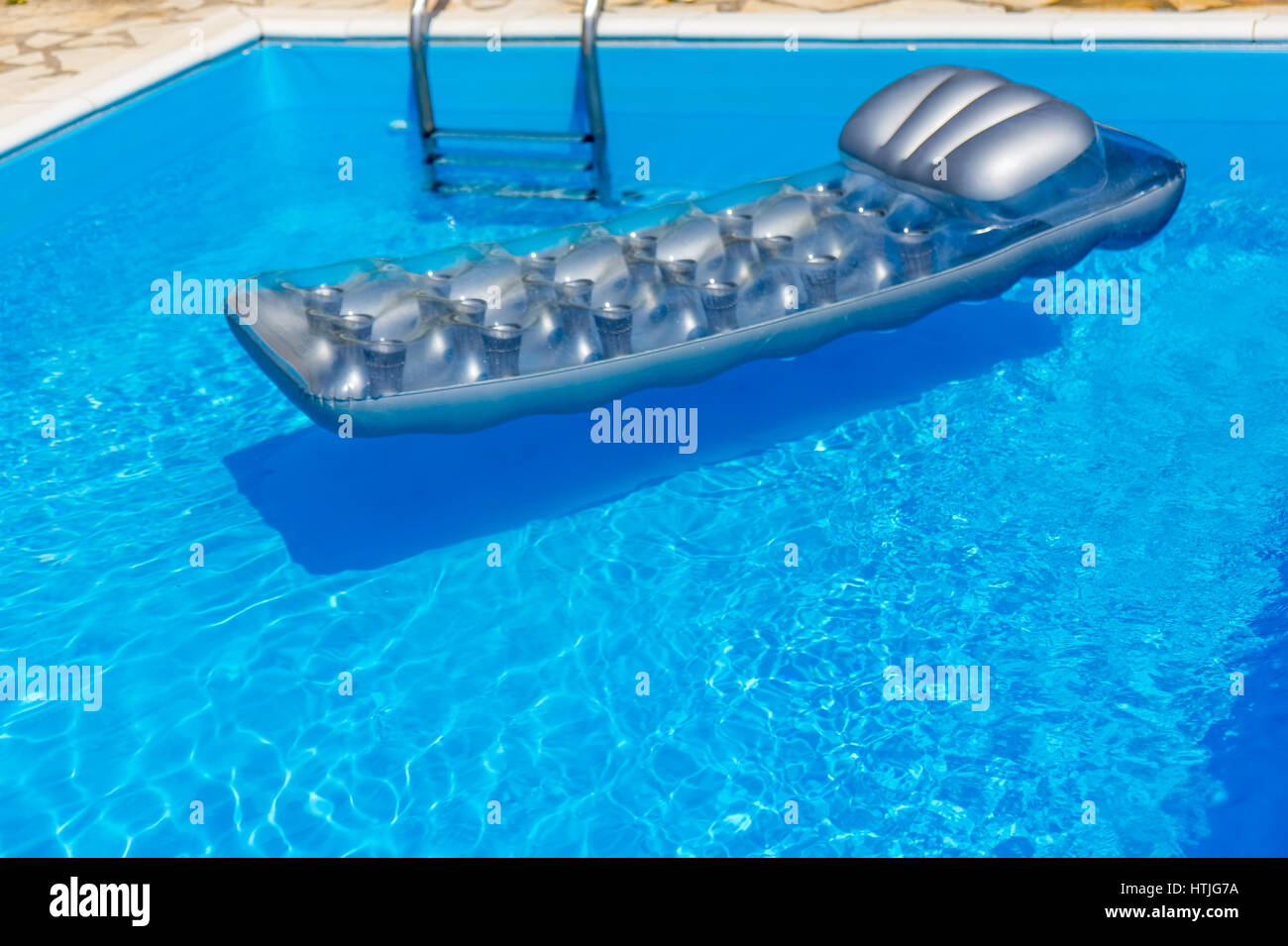 Mattress in the swimming pool Stock Photo Alamy