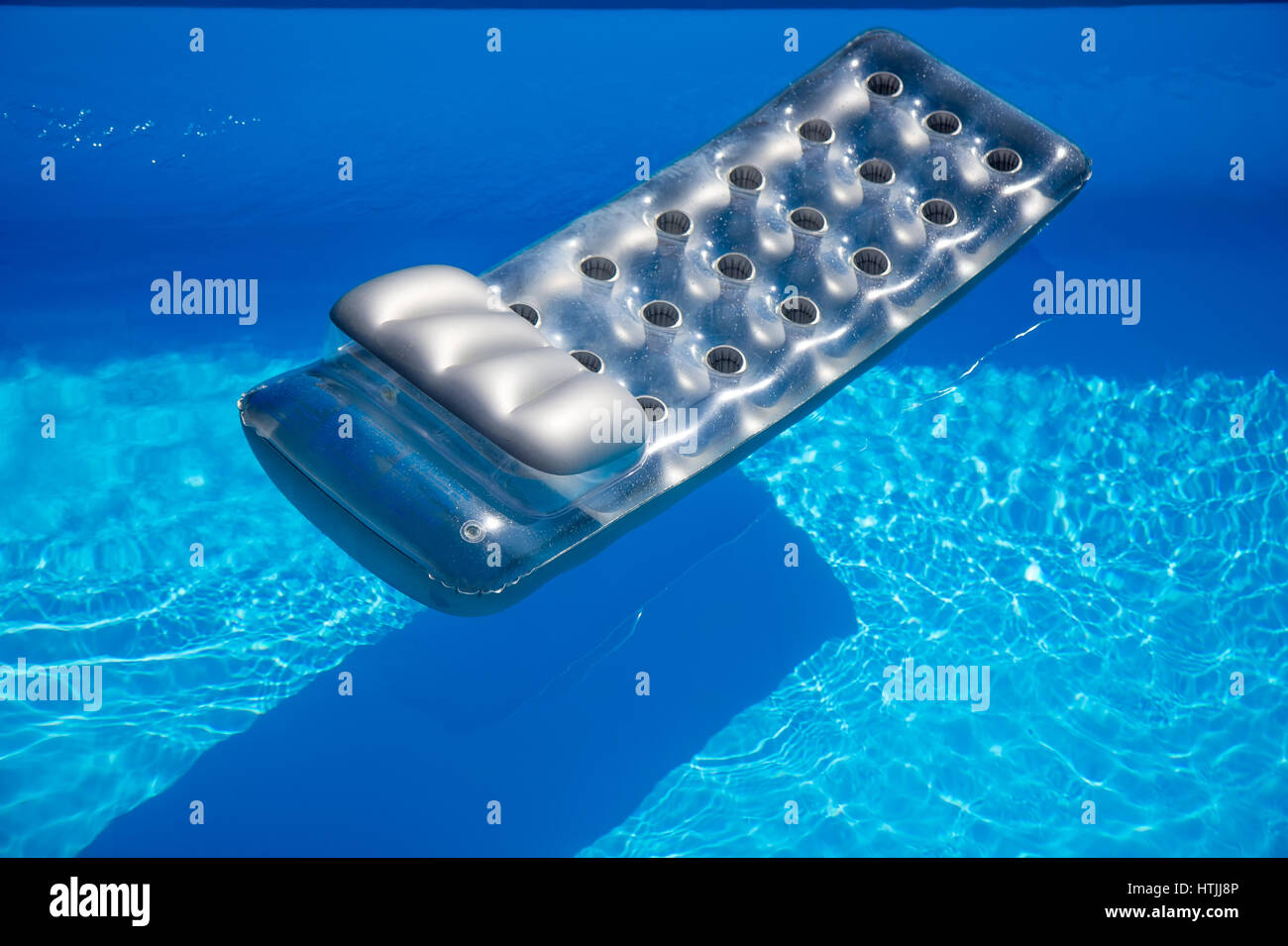 Mattress in the swimming pool Stock Photo Alamy