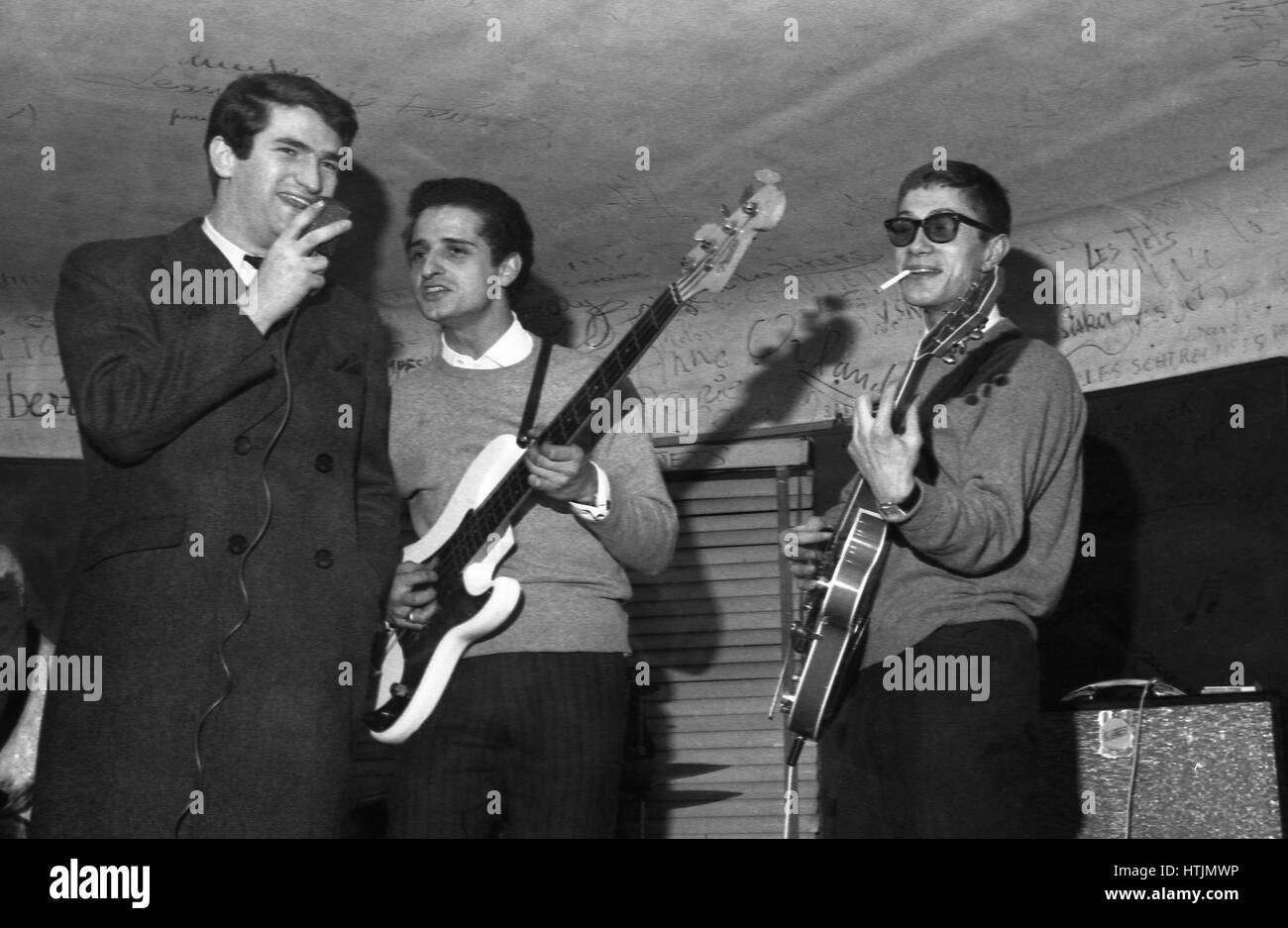 Eddy Mitchell, Aldo Martinez and Jacques Dutronc performing at the Golf-Drouot in Paris, 1965. Stock Photo