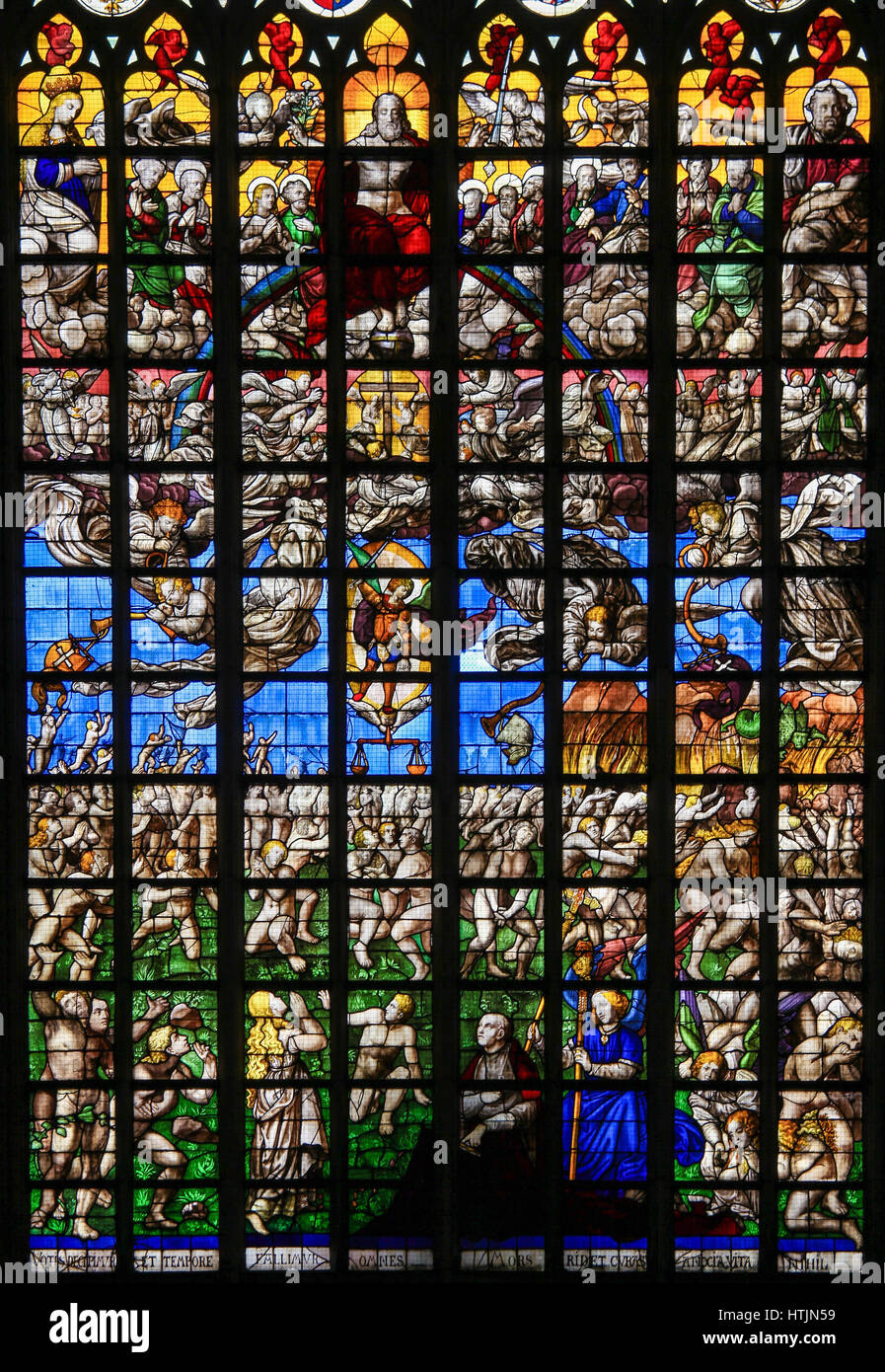 Stained glass window (1528) depicting the Last Judgment, in the Cathedral of Brussels, Belgium. Stock Photo