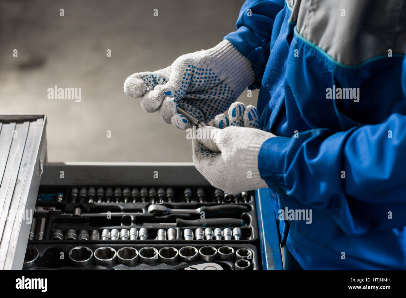 Hand holding wrench. Auto repair shop service Stock Photo Alamy