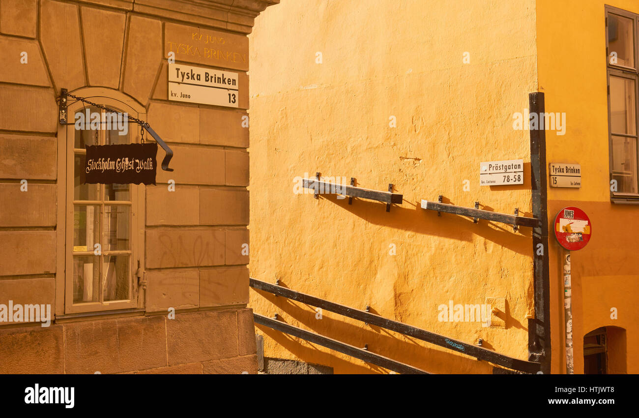 Sunlight on painted coloured wall in Stockholm's old town of Gamla Stan, Sweden, Scandinavia Stock Photo