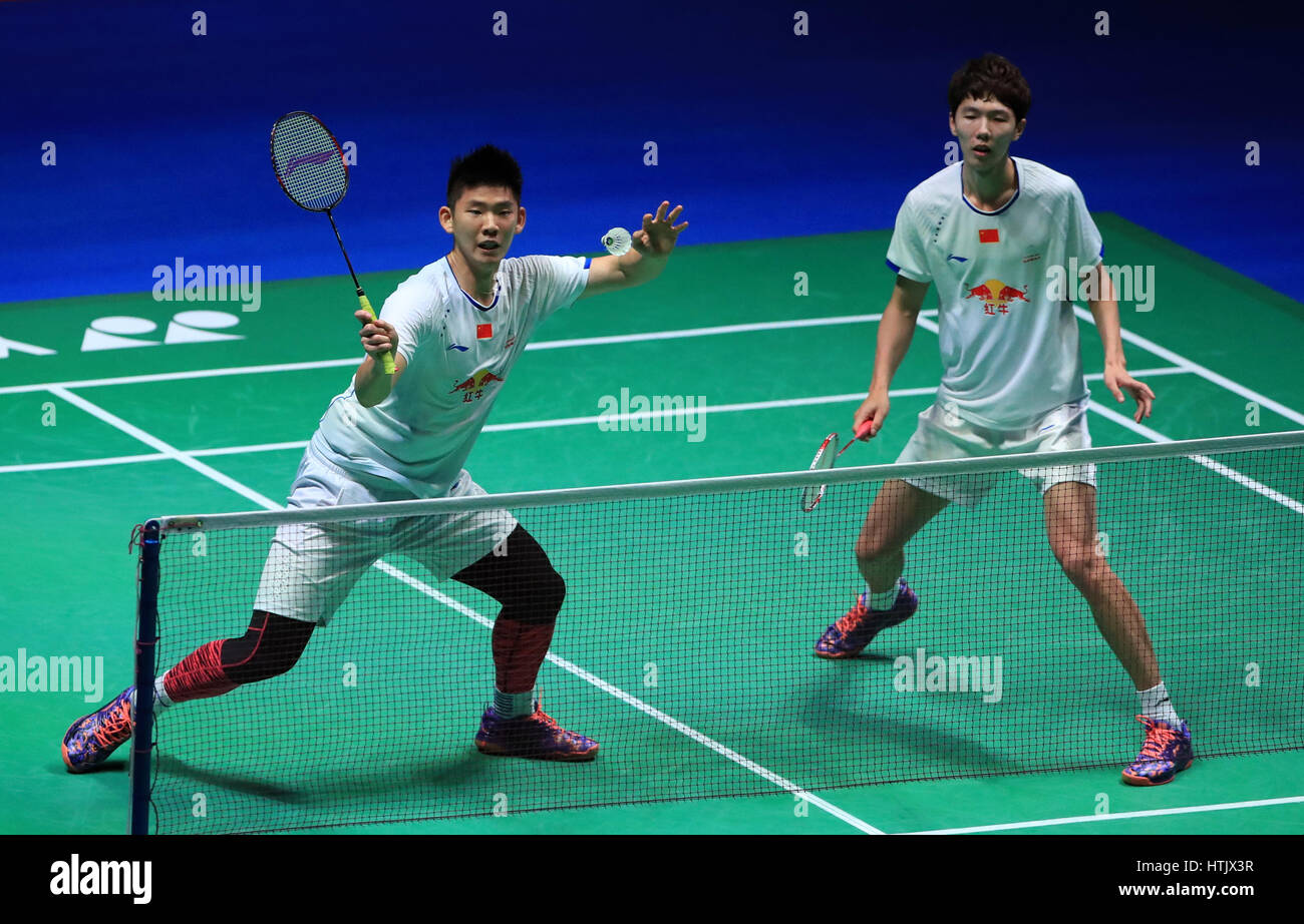China's Li Junhui and Liu Yuchen against Indonesia's Marcus Fernaldi and Kevin Sanjaya in the Men's Doubles Final during day six of the YONEX All England Open Badminton Championships at the Barclaycard Arena, Birmingham. Stock Photo