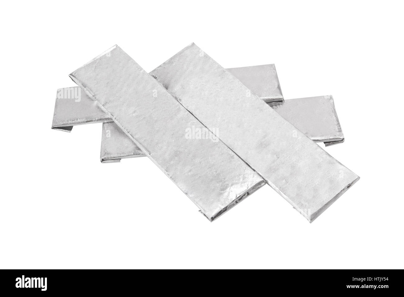 chewing gums wrapped in standard silver foil, isolated on white Stock Photo