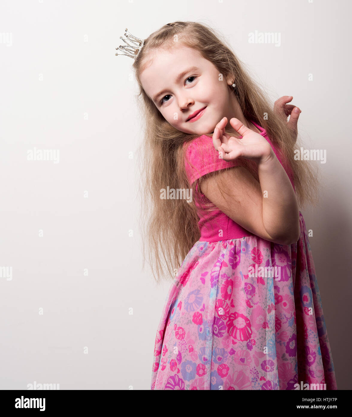 Princess in a pink dress and crown Stock Photo - Alamy