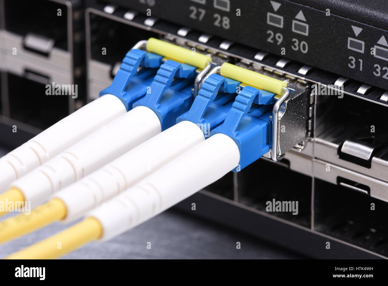 Internet Technology Devices Fiber Optic Network Cables in Switch Stock Photo