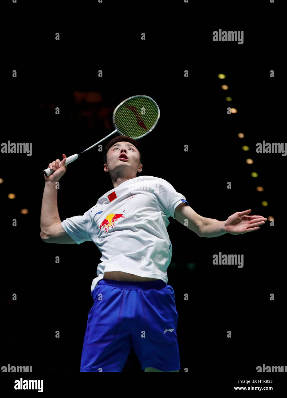 Birmingham. 12th Mar, 2017. Shi Yuqi of China competes during the men's singles final with Lee Chong Wei of Malaysia at All England Open Badminton Championships 2017 in Birmingham, Britain on March 12, 2017. Credit: Han Yan/Xinhua/Alamy Live News Stock Photo