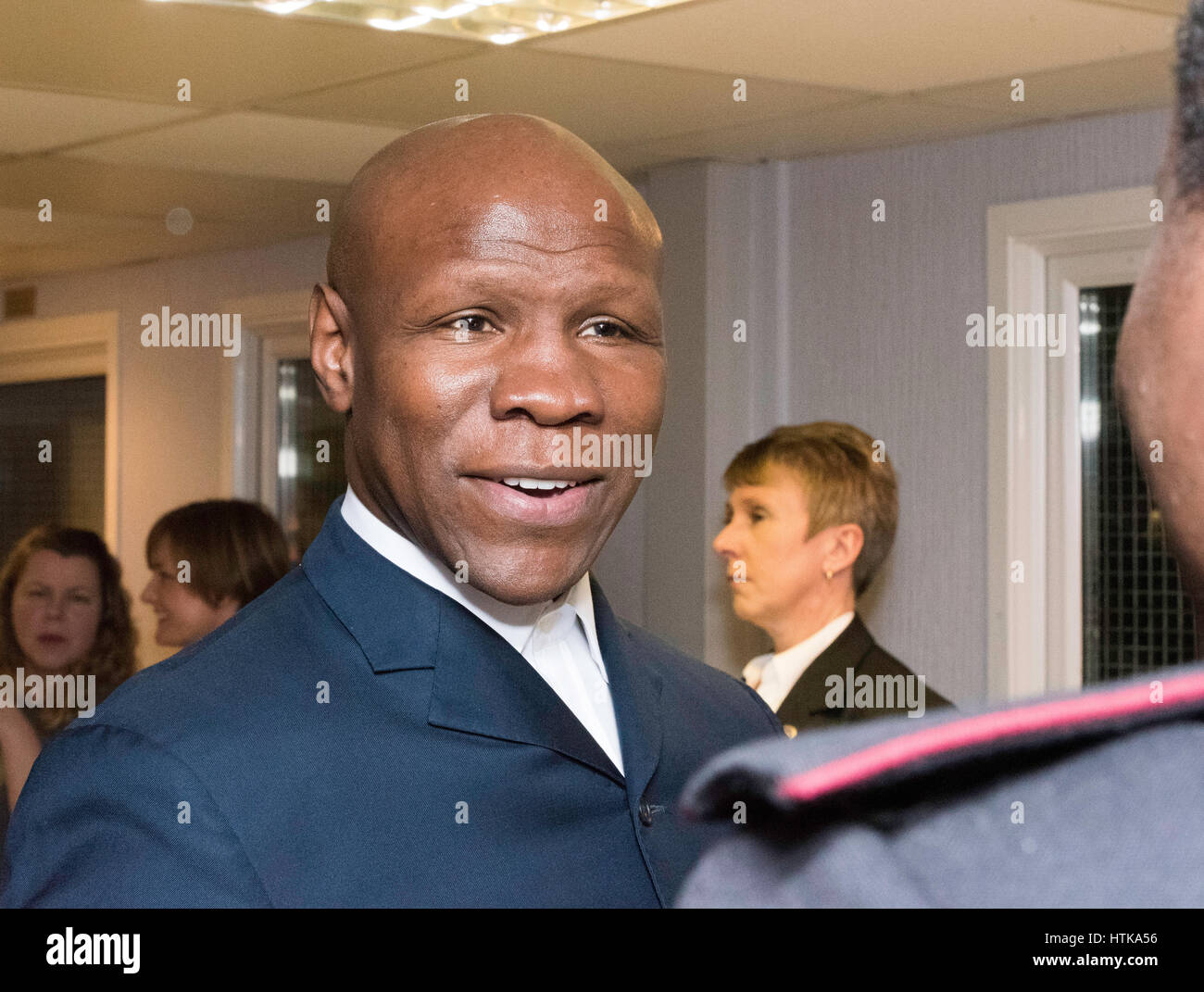 Brentwood, 12th March 2017; Chris Eubank, Former World boxing Champion, greets a member of the Parachute Regiment Band at a youth concet in Brentwood, Essex Credit: Ian Davidson/Alamy Live News Stock Photo