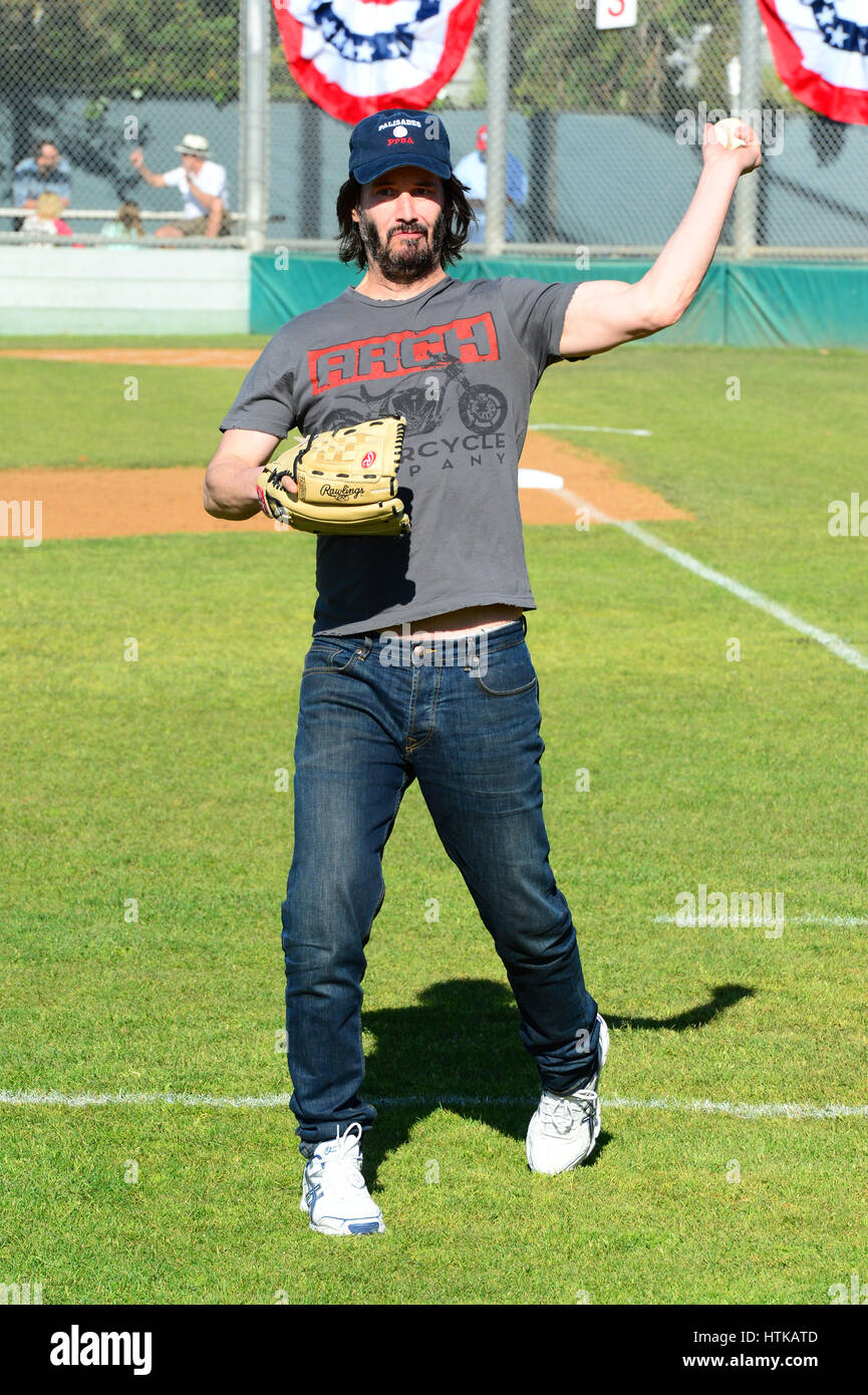 Pacific Palisades, CA, USA. 11th Mar, 2017. Actor Keanu Reeves throws ...