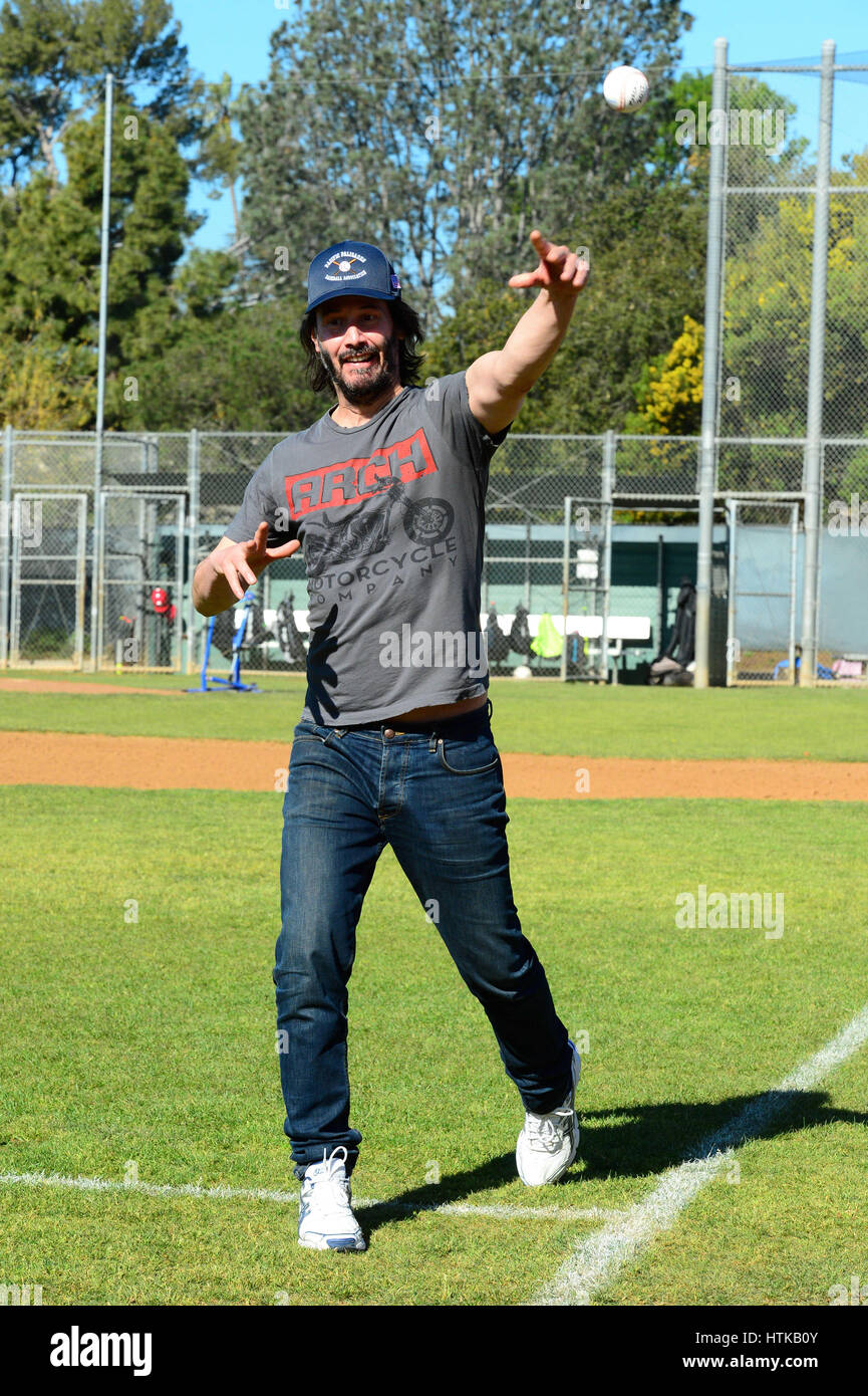 Pacific Palisades, CA, USA. 11th Mar, 2017. Actor Keanu Reeves throws ...