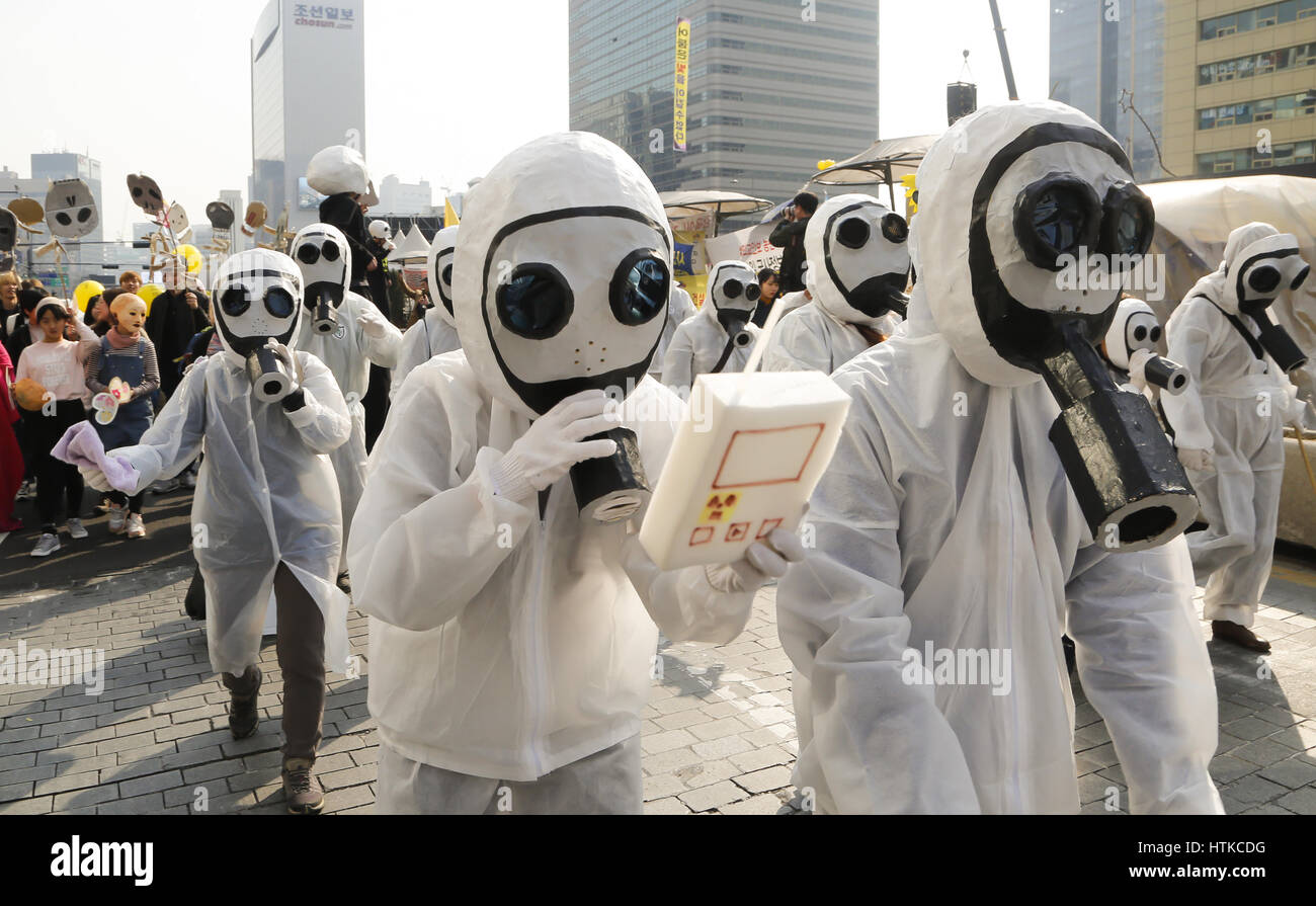 The sixth anniversary of the 2011 Fukushima nuclear disaster, Mar 11, 2017 : People march during a memorial rally marking the sixth anniversary of the 2011 Fukushima nuclear disaster in Seoul, South Korea. The March 11, 2011 earthquake and tsunami killed more than 18,000 people in Japan. Participants demanded the government to stop nuclear project and establish more solar energy generation during a rally which was held also as a part of mass rally held to celebrate after the Constitutional Court on Friday upheld the impeachment of President Park Geun-hye. (Photo by Lee Jae-Won/AFLO) (SOUTH KOR Stock Photo