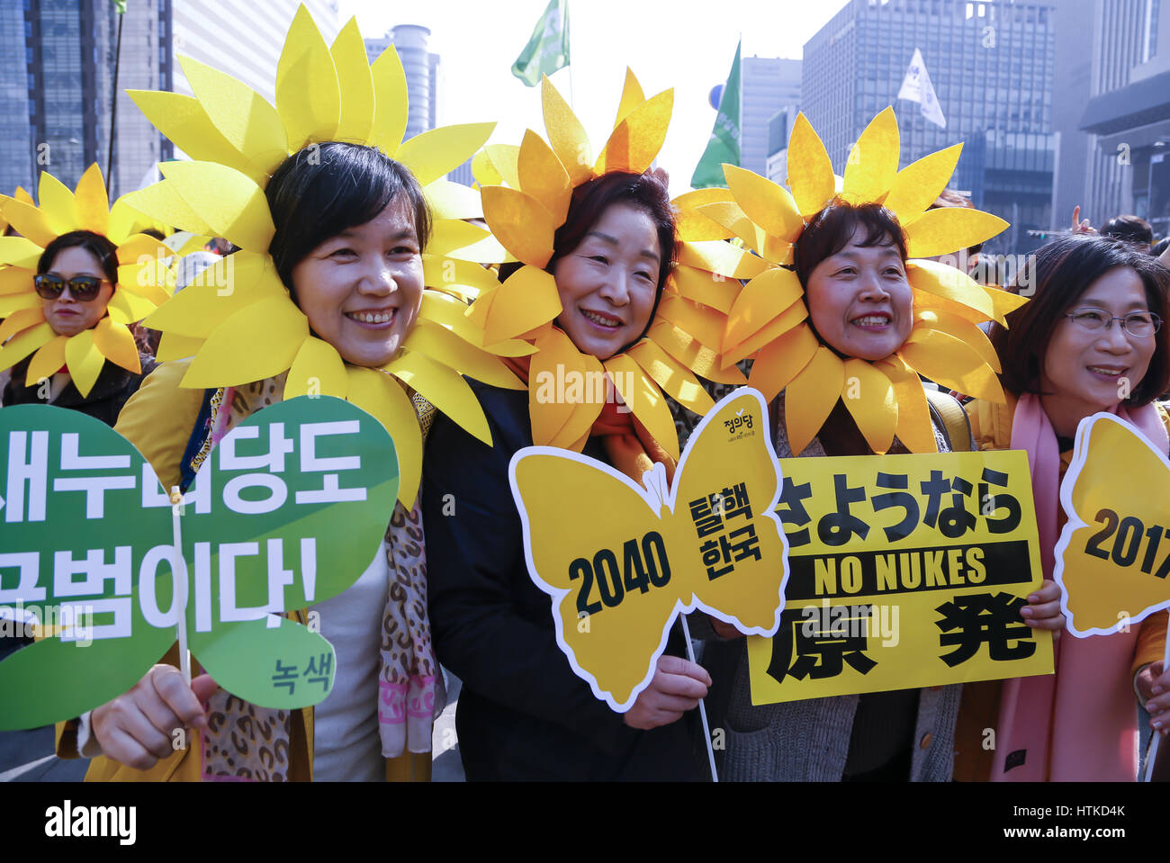 The sixth anniversary of the 2011 Fukushima nuclear disaster, Mar 11, 2017 : Sim Sang-Jung (3rd R), a lawmaker and leader of the Justice Party of South Korea with other environmental activists attend attend a memorial rally marking the sixth anniversary of the 2011 Fukushima nuclear disaster in Seoul, South Korea. The March 11, 2011 earthquake and tsunami killed more than 18,000 people in Japan. Participants demanded the government to stop nuclear project and establish more solar energy generation during a rally which was held also as a part of mass rally held to celebrate after the Constituti Stock Photo