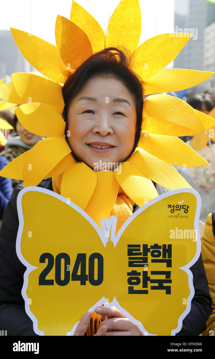 The sixth anniversary of the 2011 Fukushima nuclear disaster, Mar 11, 2017 : Sim Sang-Jung, a lawmaker and leader of the Justice Party of South Korea attends a memorial rally marking the sixth anniversary of the 2011 Fukushima nuclear disaster in Seoul, South Korea. The March 11, 2011 earthquake and tsunami killed more than 18,000 people in Japan. Participants demanded the government to stop nuclear project and establish more solar energy generation during a rally which was held also as a part of mass rally held to celebrate after the Constitutional Court on Friday upheld the impeachment of Pr Stock Photo