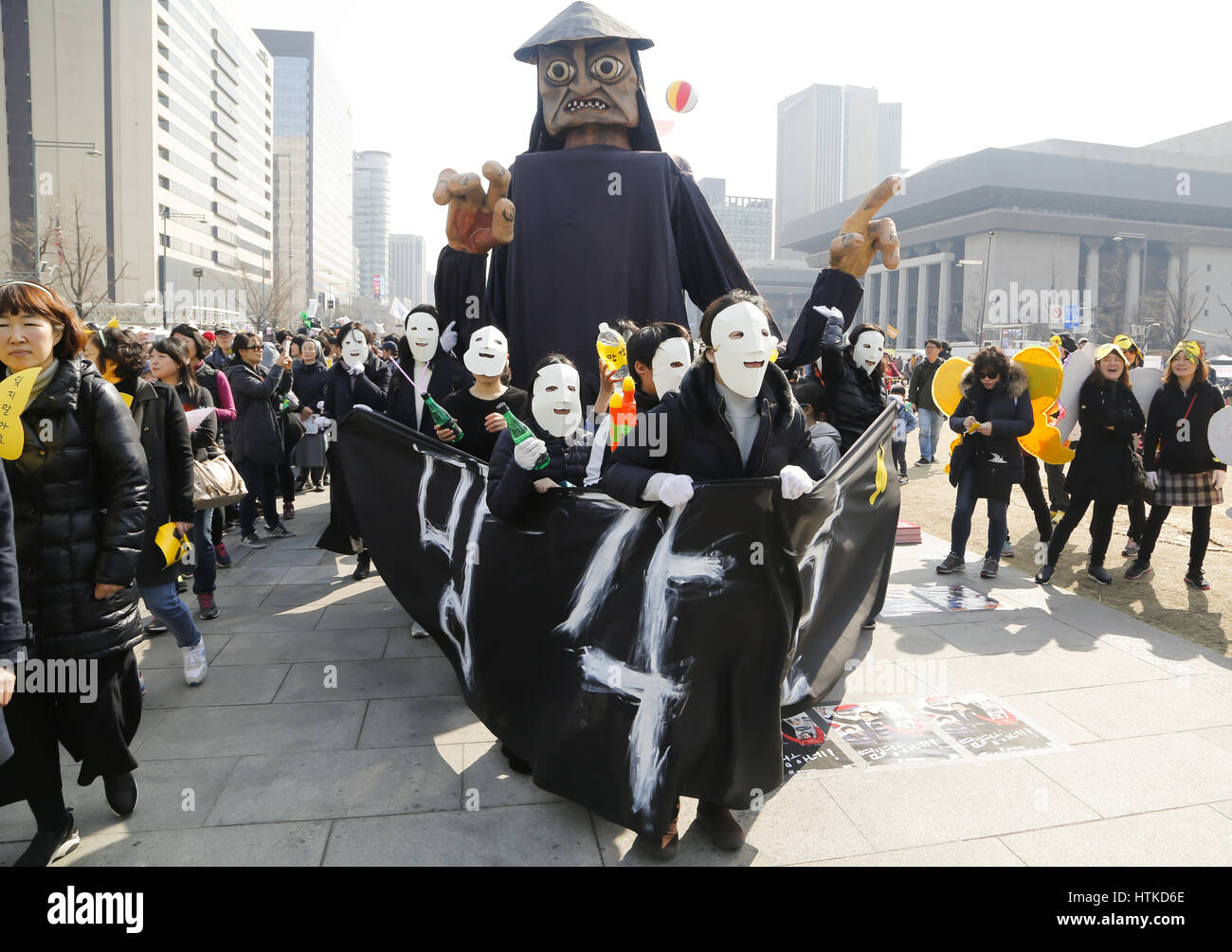 The sixth anniversary of the 2011 Fukushima nuclear disaster, Mar 11, 2017 : People attend a memorial rally marking the sixth anniversary of the 2011 Fukushima nuclear disaster in Seoul, South Korea. The March 11, 2011 earthquake and tsunami killed more than 18,000 people in Japan. Participants demanded the government to stop nuclear project and establish more solar energy generation during a rally which was held also as a part of mass rally held to celebrate after the Constitutional Court on Friday upheld the impeachment of President Park Geun-hye. Korean characters on the placard read,'Obliv Stock Photo