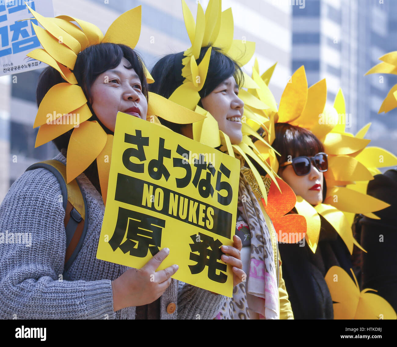 The sixth anniversary of the 2011 Fukushima nuclear disaster, Mar 11, 2017 : People attend a memorial rally marking the sixth anniversary of the 2011 Fukushima nuclear disaster in Seoul, South Korea. The March 11, 2011 earthquake and tsunami killed more than 18,000 people in Japan. Participants demanded the government to stop nuclear project and establish more solar energy generation during a rally which was held also as a part of mass rally held to celebrate after the Constitutional Court on Friday upheld the impeachment of President Park Geun-hye. Credit: Lee Jae-Won/AFLO/Alamy Live News Stock Photo