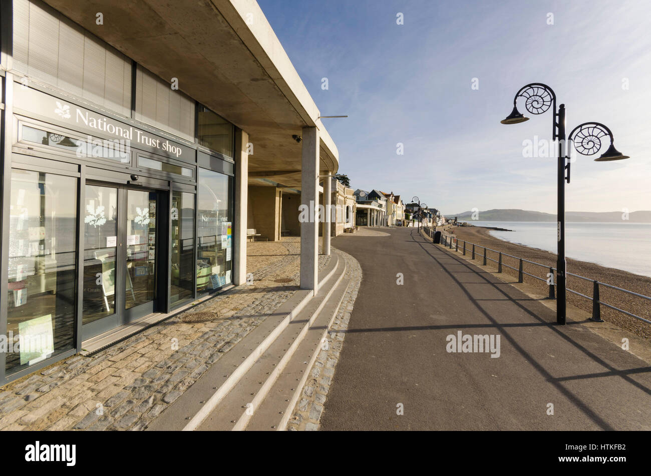 Lyme Regis, Dorset, UK.  13th March 2017.  UK Weather. Beautiful warm spring sunshine and blues skies during the morning at the seaside resort of Lyme Regis on the Dorset Jurassic Coast.  The view is Marine Parade on the seafront.  Photo by Graham Hunt/Alamy Live News Stock Photo