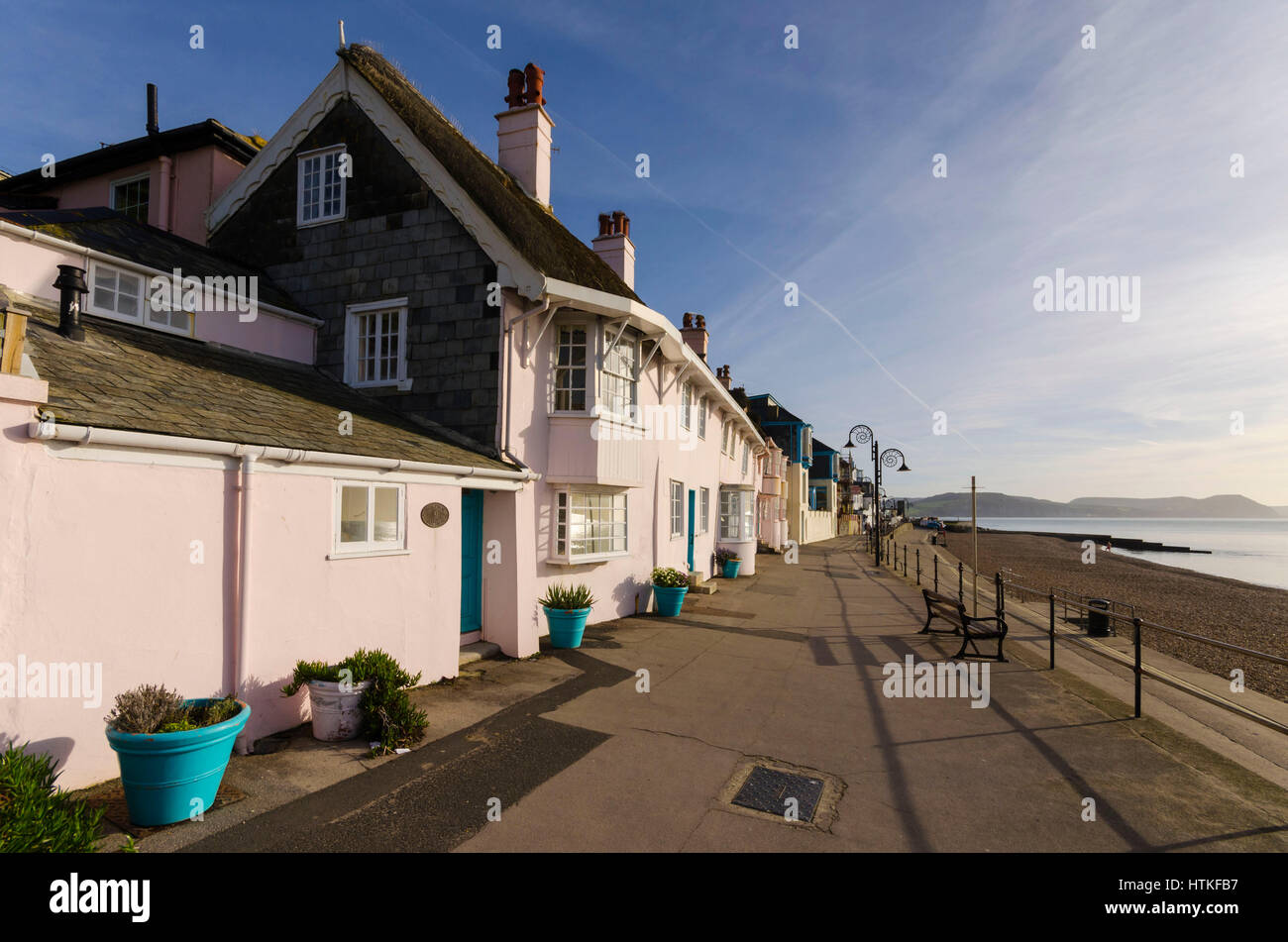 Lyme Regis, Dorset, UK.  13th March 2017.  UK Weather. Beautiful warm spring sunshine and blues skies during the morning at the seaside resort of Lyme Regis on the Dorset Jurassic Coast.  The view is Marine Parade on the seafront.  Photo by Graham Hunt/Alamy Live News Stock Photo