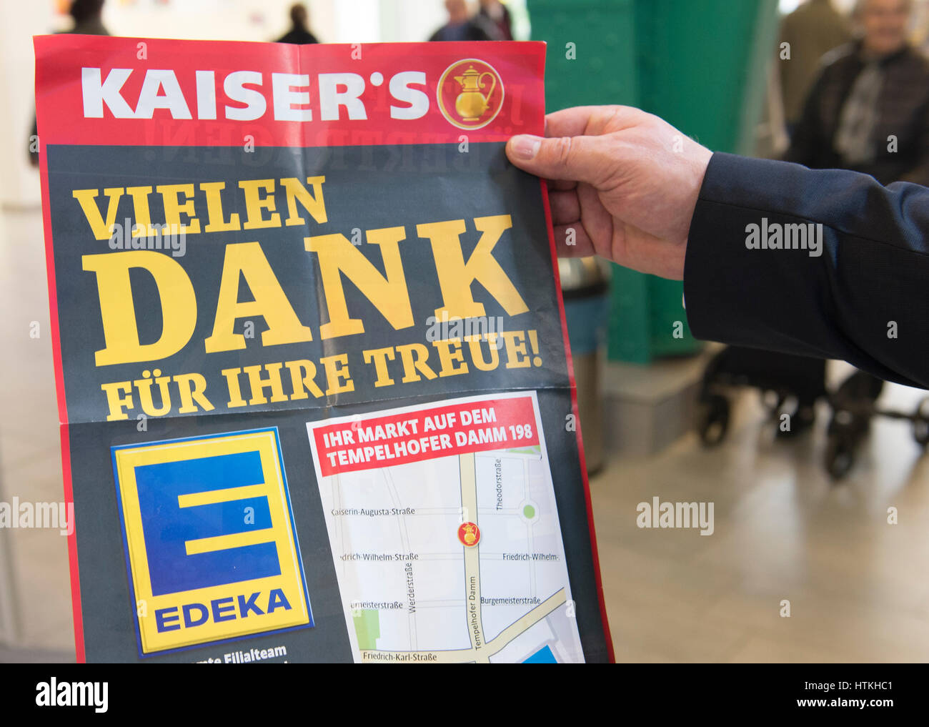 Berlin, Germany. 13th Mar, 2017. ILLUSTRATION - 'Thank you for your loyalty!' reads a brochure at a new branch of the German supermarket chain Edeka in Berlin, Germany, 13 March 2017. The business belonged to the former Kaiser's chain, which is now being integrated into Edeka after being taken over by the group. Photo: Paul Zinken/dpa/Alamy Live News Stock Photo