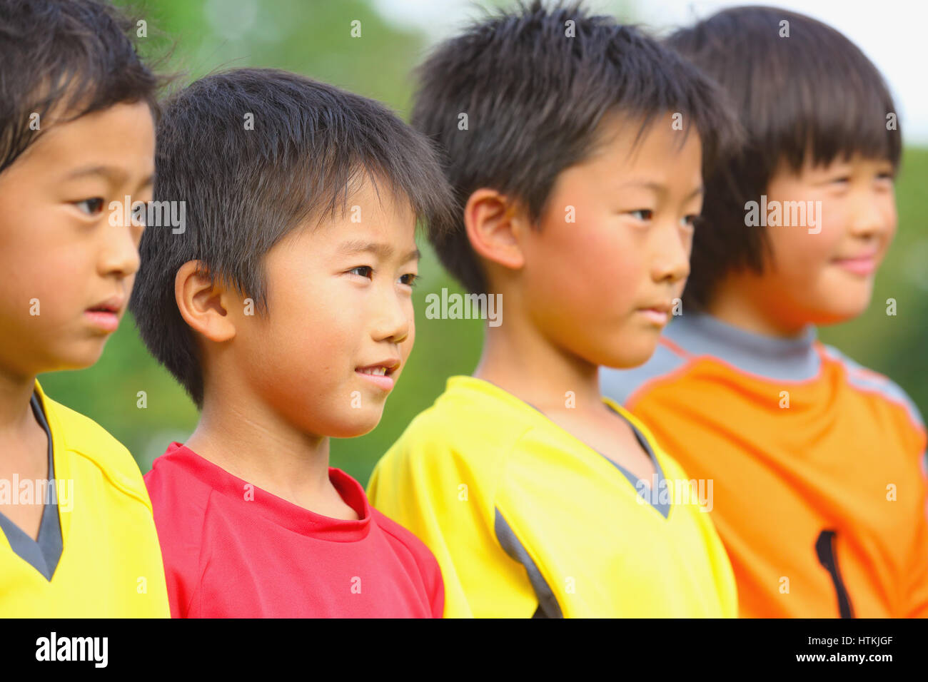 Japanese kids playing soccer Stock Photo Alamy
