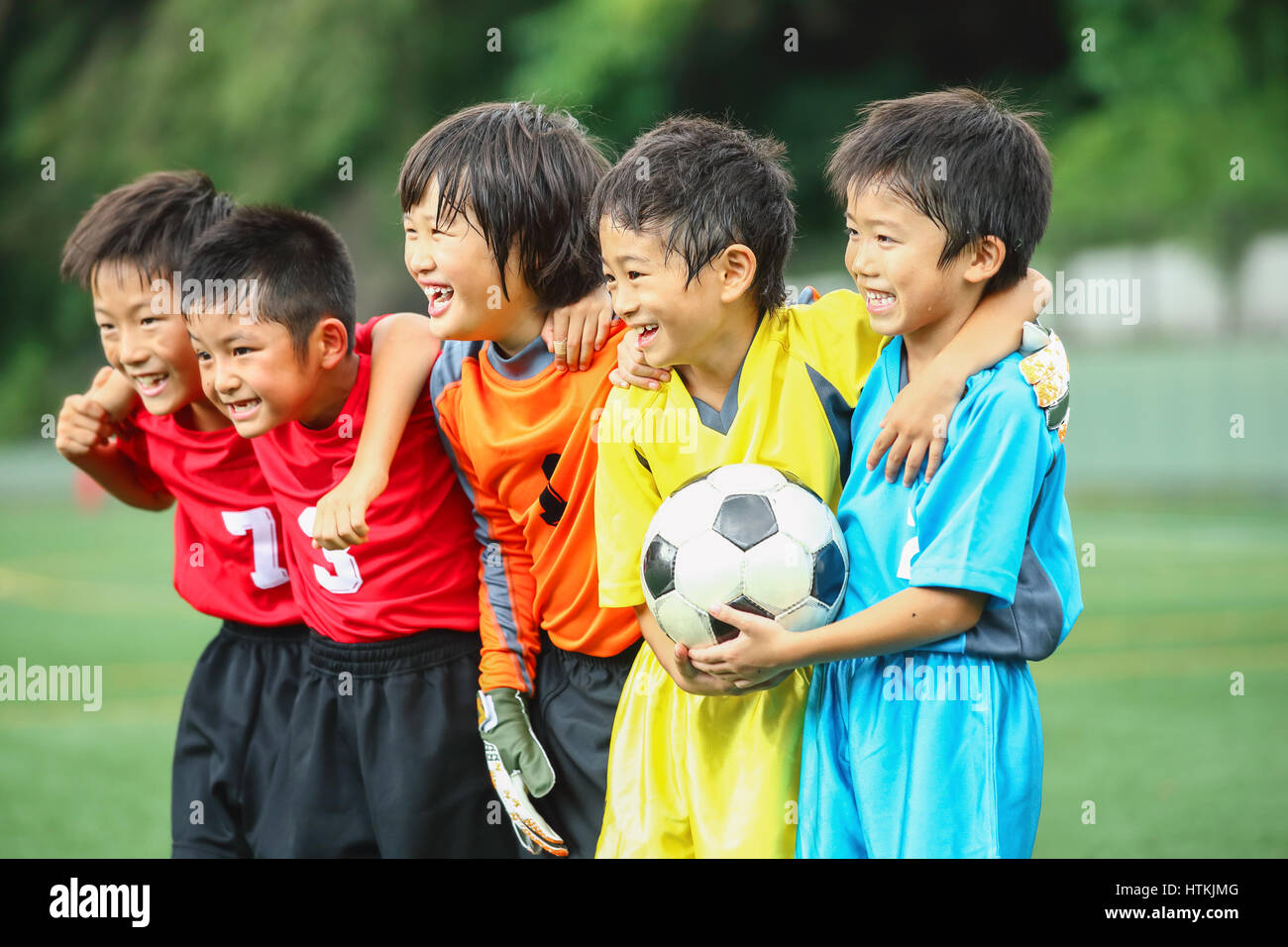 Japanese kids playing soccer Stock Photo Alamy