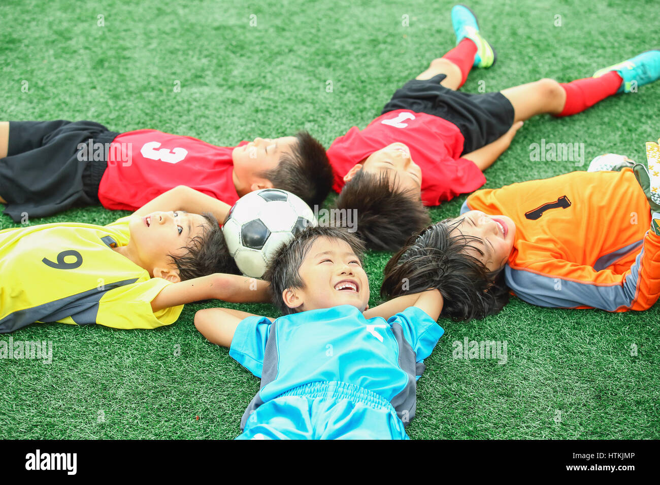 Japanese kids playing soccer Stock Photo Alamy