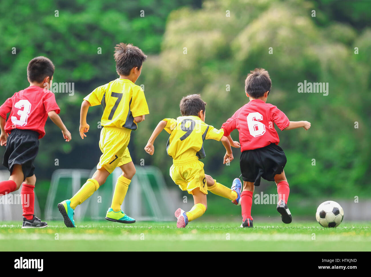 Japanese kids playing soccer Stock Photo Alamy