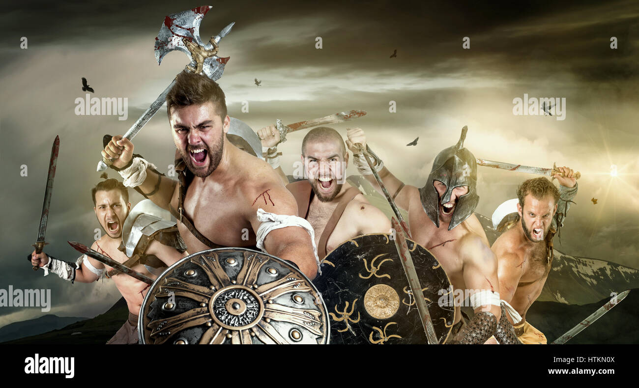 Group of ancient warriors or Gladiators ready to battle outdoors Stock Photo