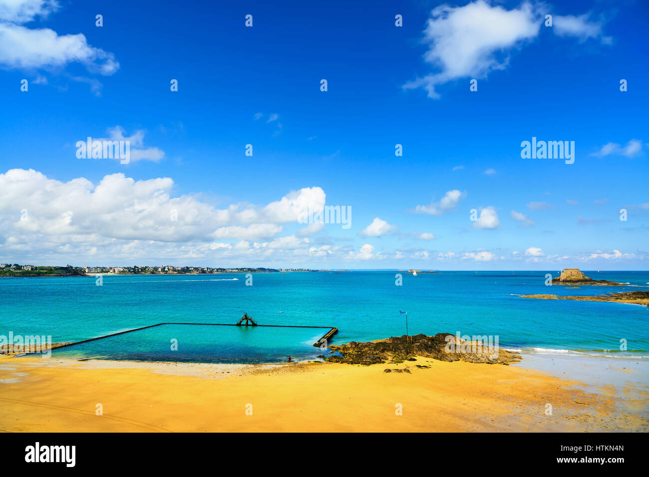 Saint Malo beach view from wall ramparts and fort on background. View to Dinard. Brittany, France, Europe Stock Photo