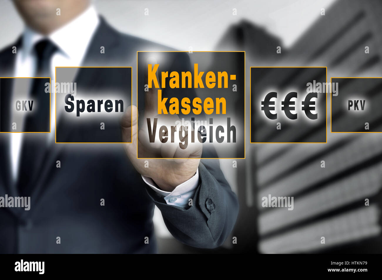 Krankenkassen Vergleich (in german Healthcare comparison, save) touchscreen is operated by a businessman. Stock Photo