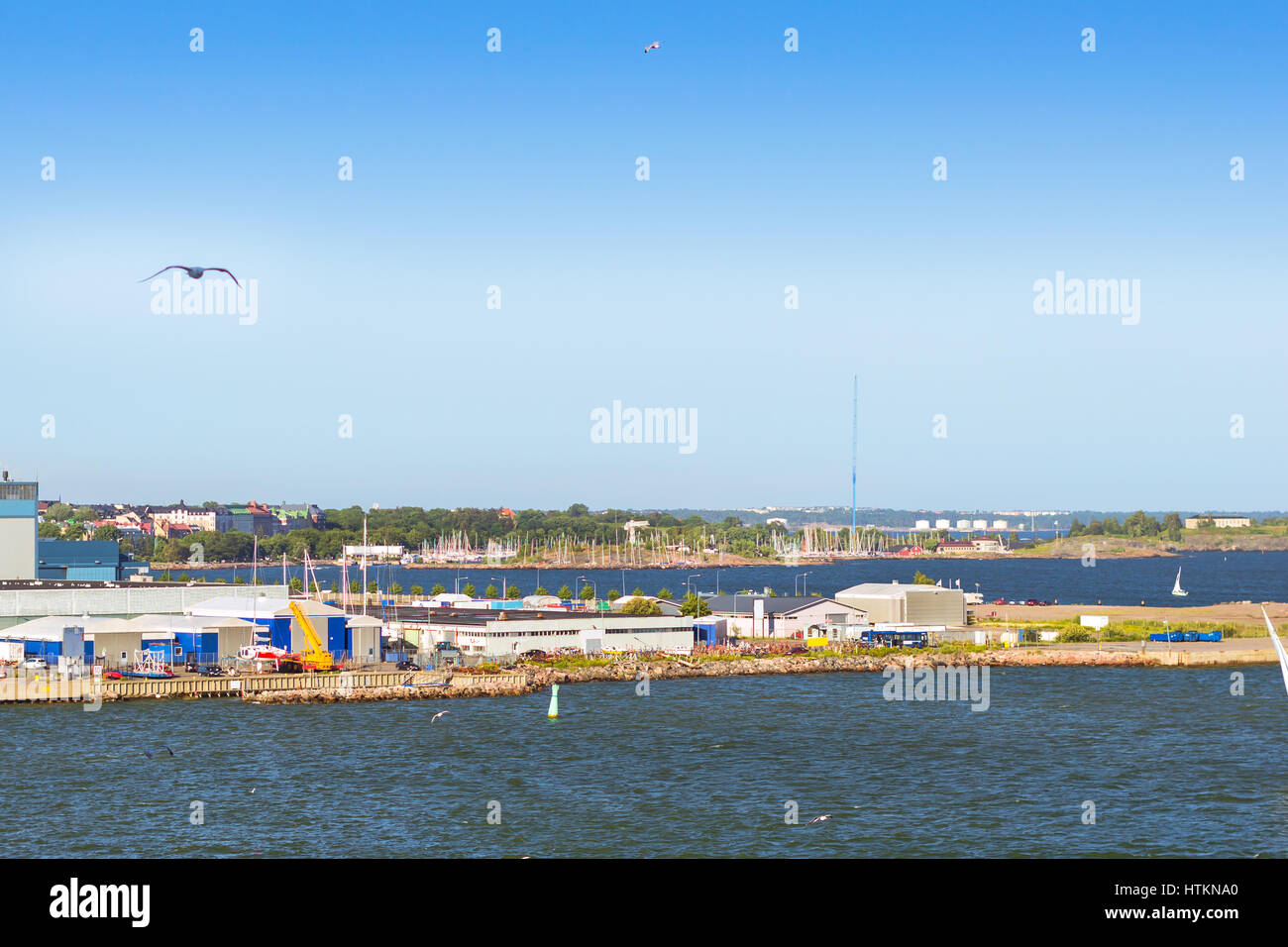 Ferry cargo-passenger terminal West Harbour. Developed infrastructure of Scandinavian sea port. Outbuildings and hangars with industrial port equipmen Stock Photo