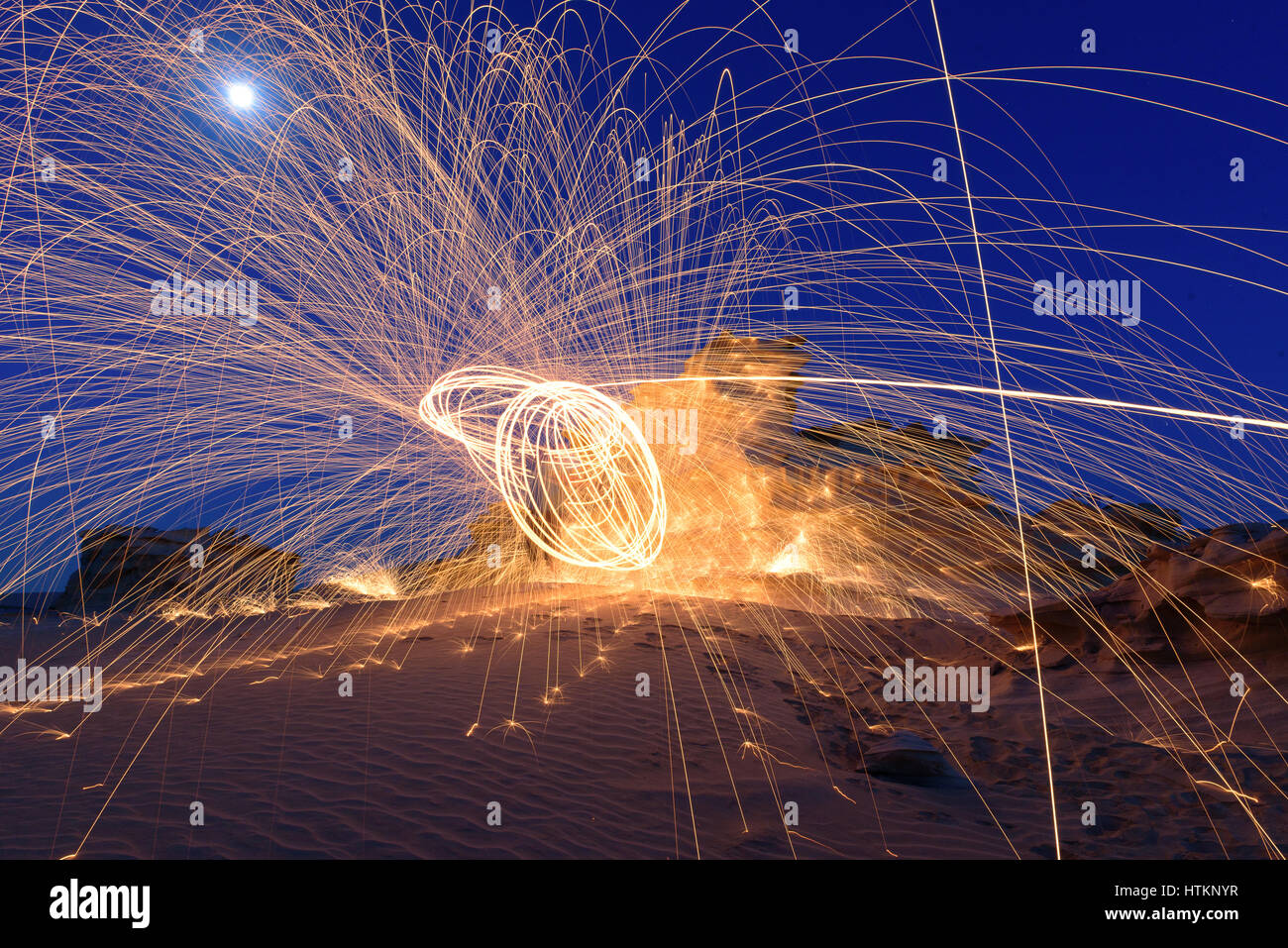 Burning Steel Wool spinning. Showers of glowing sparks from spinning steel wool Stock Photo