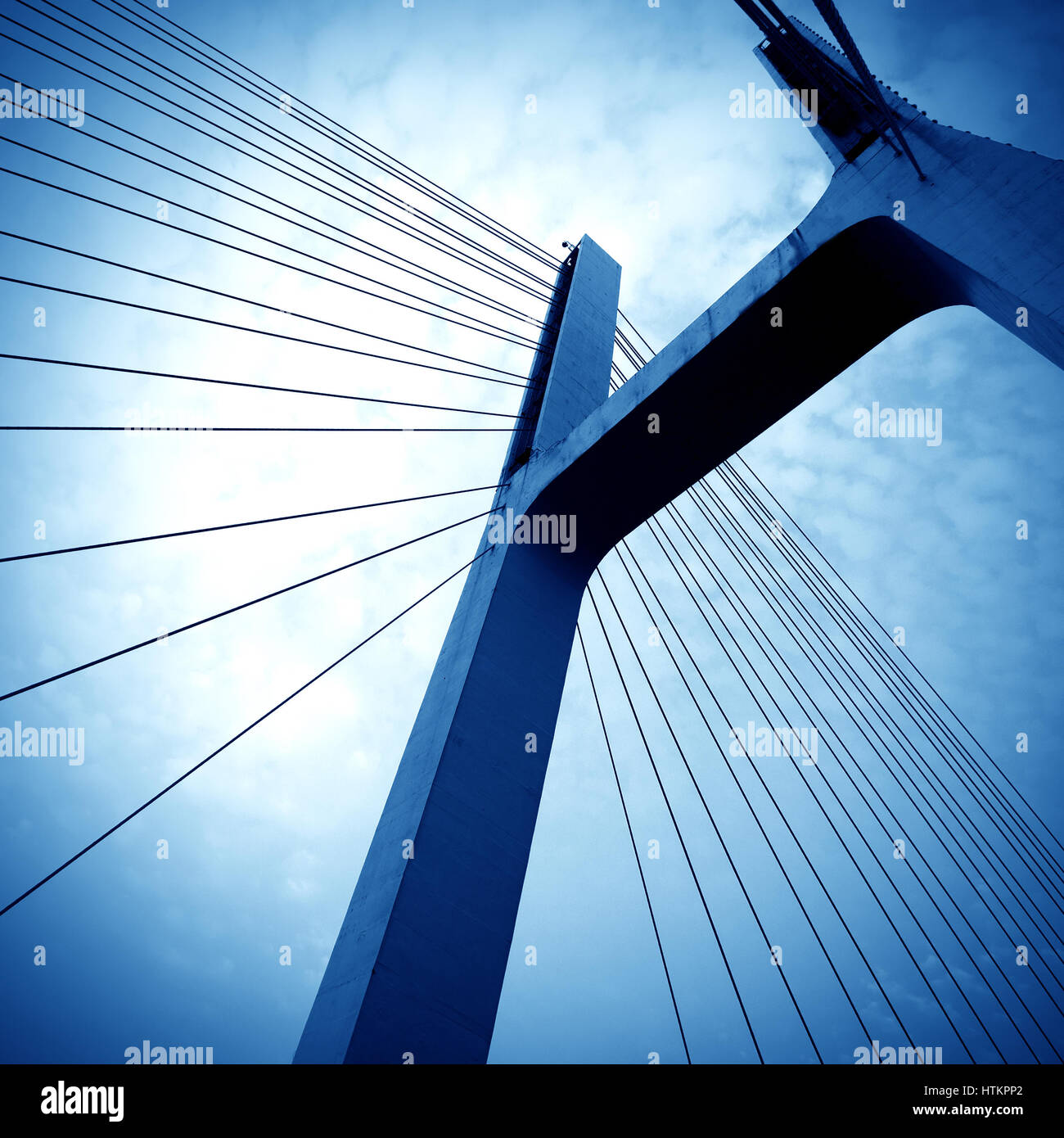Suspension bridge with cables reaching to the deck of the bridge from
