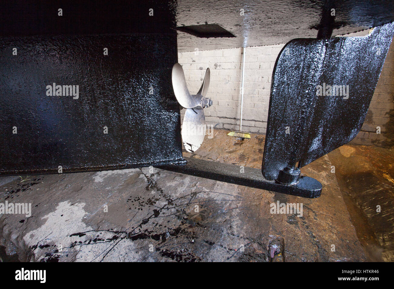 Narrow boat in dry dock for blacking Stock Photo - Alamy