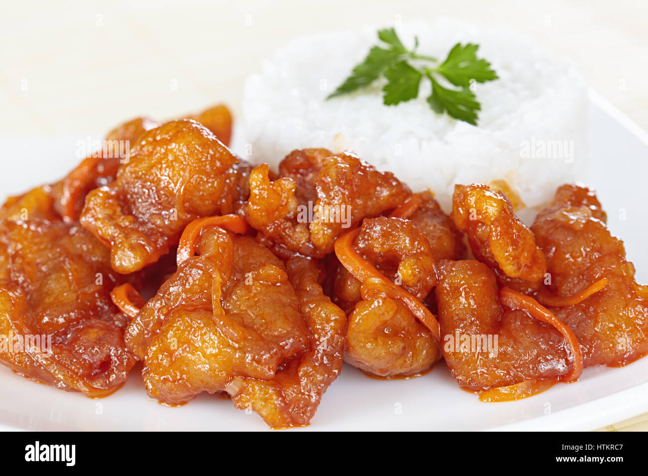 Chinese cuisine. Pork in batter and sweet and sour sauce Stock Photo