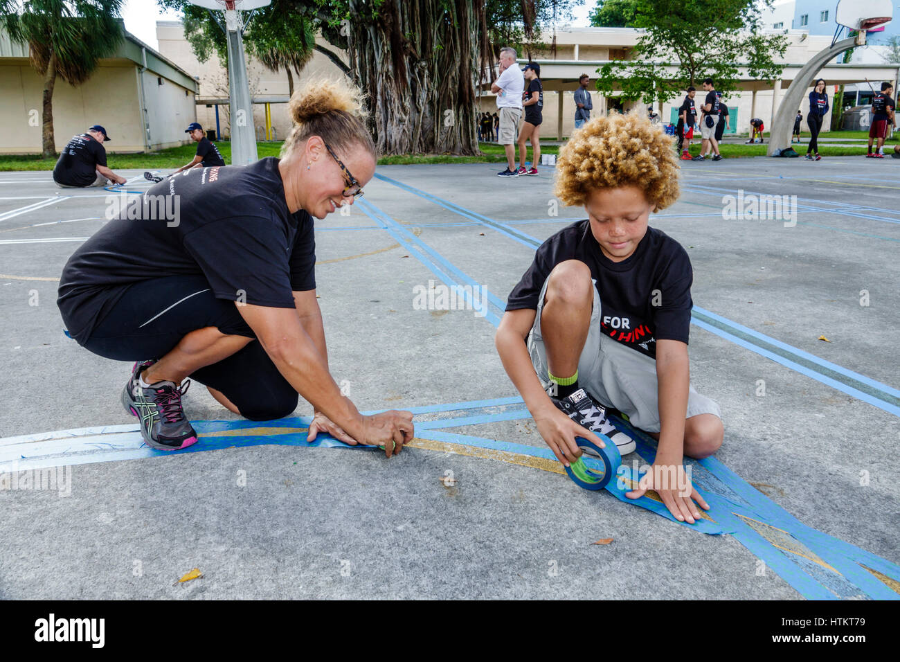 Miami Florida,Allapattah,Comstock Elementary School,Martin Luther King Jr. Day of Service,MLK,beautification project,woman female women,boy boys,male Stock Photo