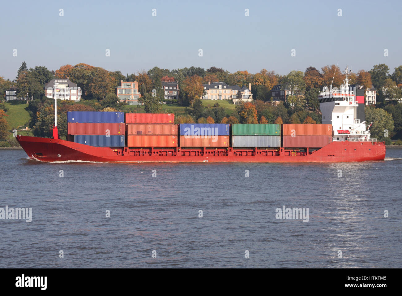 container ship on the river Elbe outbound Hamburg Stock Photo