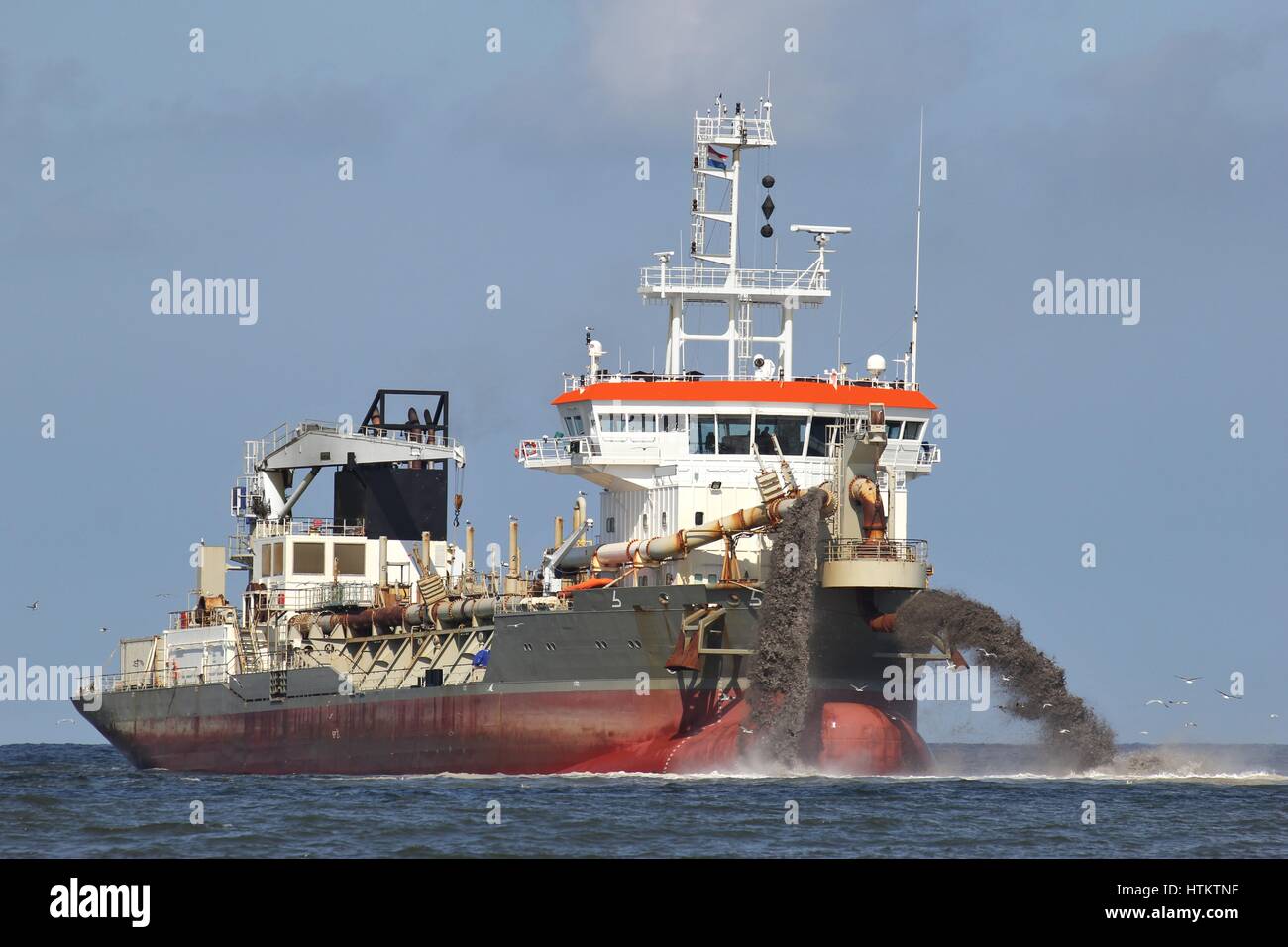 trailing suction hopper dredger creating land Stock Photo Alamy