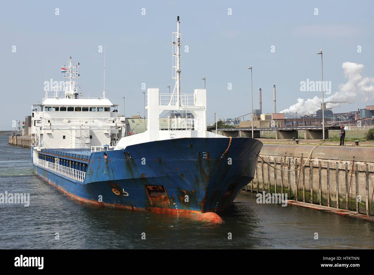 general cargo vessel entering sluice Stock Photo