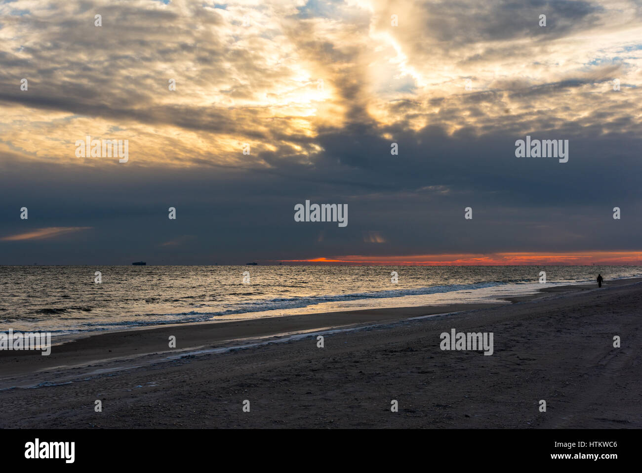 Lonely man snow beach hi-res stock photography and images - Alamy