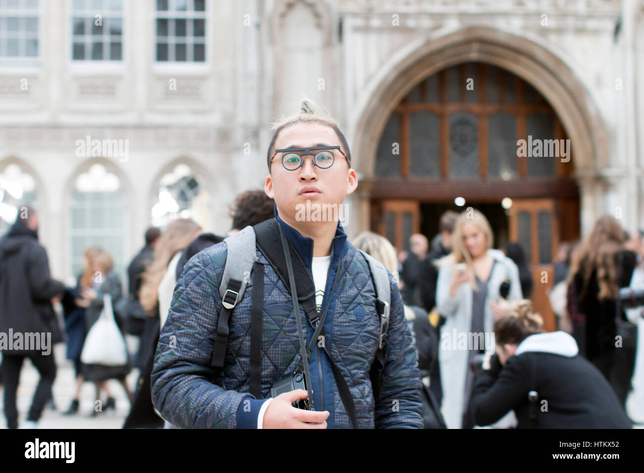 Man with glasses at London Fashion Week Stock Photo