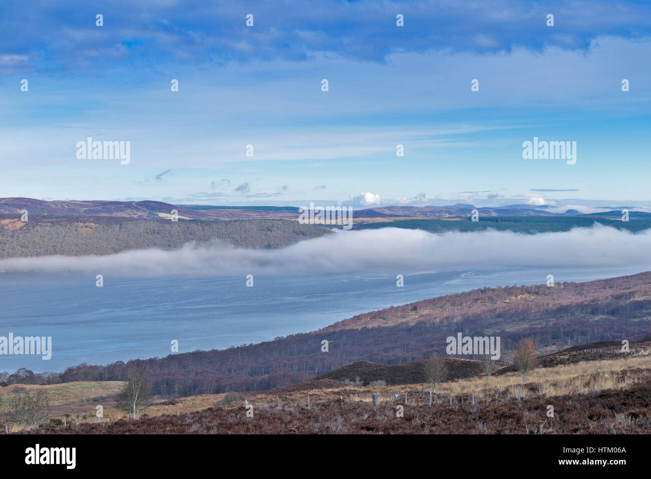 STRUIE HILL VIEW IN MARCH WITH CLOUD INVERSION AND MORNING MISTS LIFTING OVER THE DORNOCH FIRTH  SUTHERLAND Stock Photo