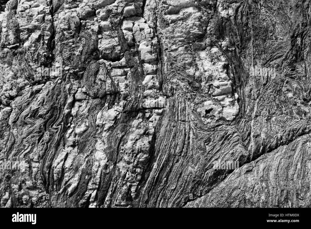 Abstract stone background - black, grey, dark stone texture - folded rocks Stock Photo