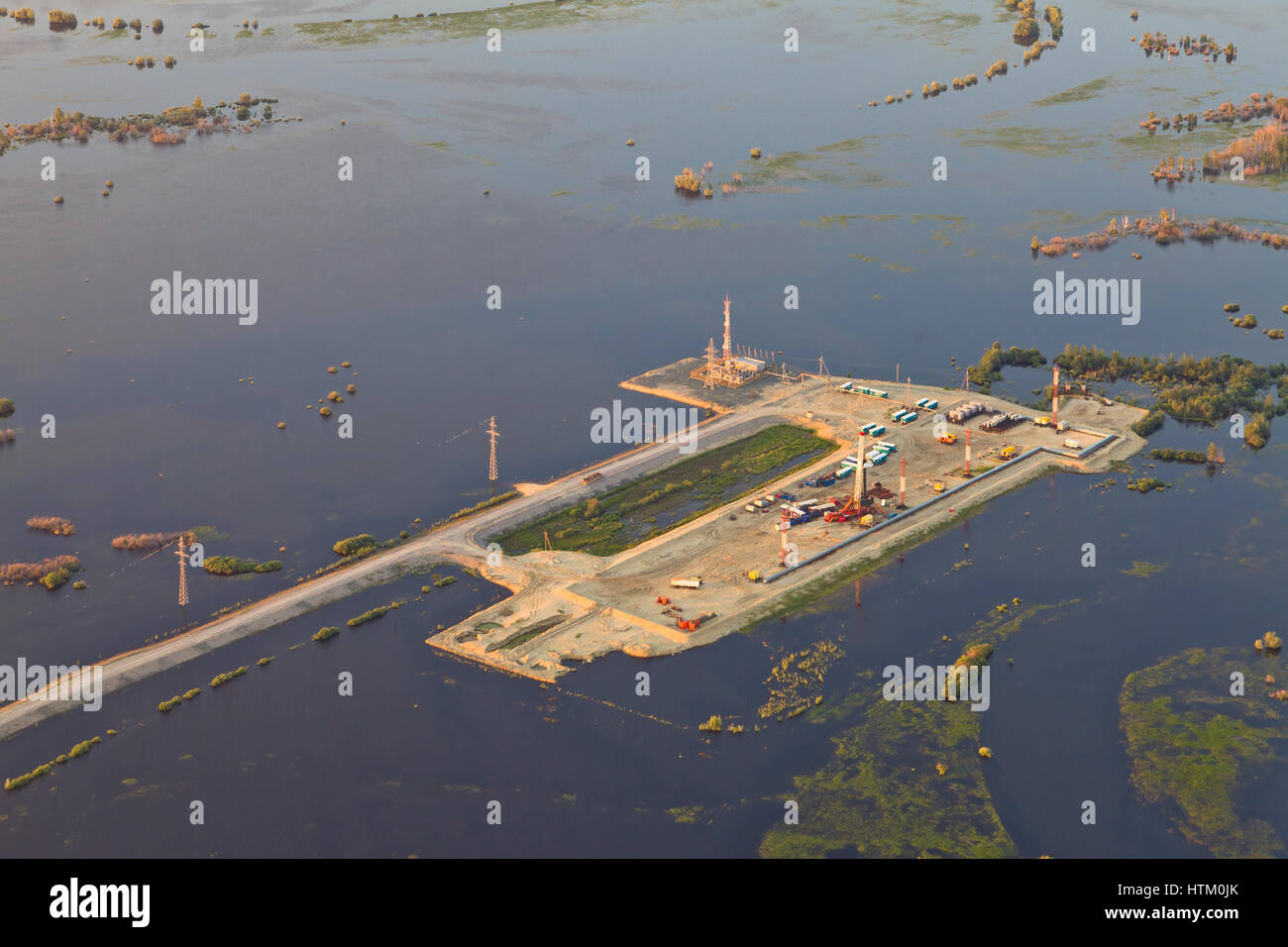 Oil rig in flood area, top view Stock Photo
