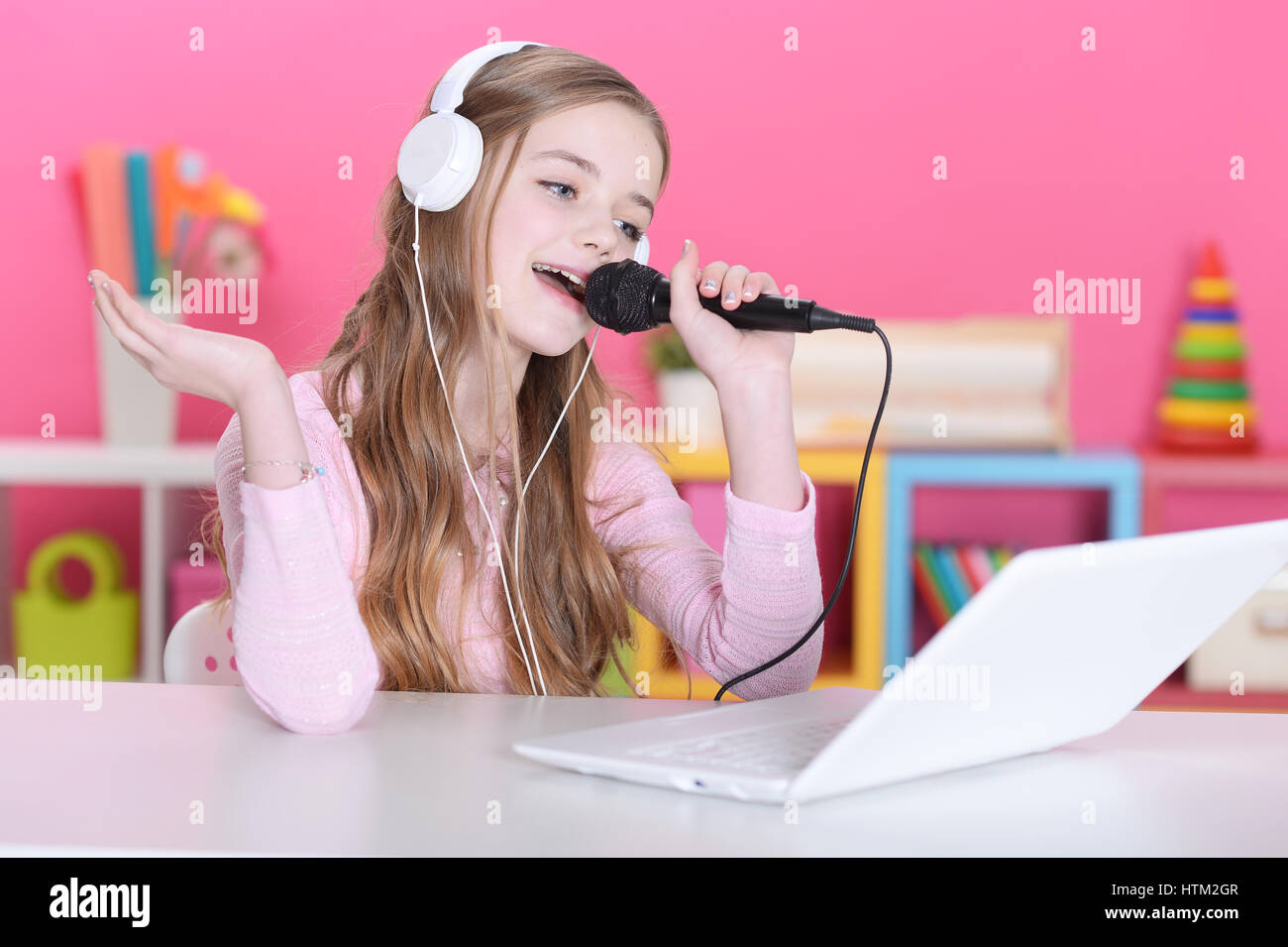 Child teen girl singing microphone hires stock photography and images
