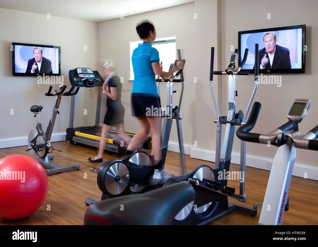 Women working out in modern gym, Wales, United Kingdom Stock Photo