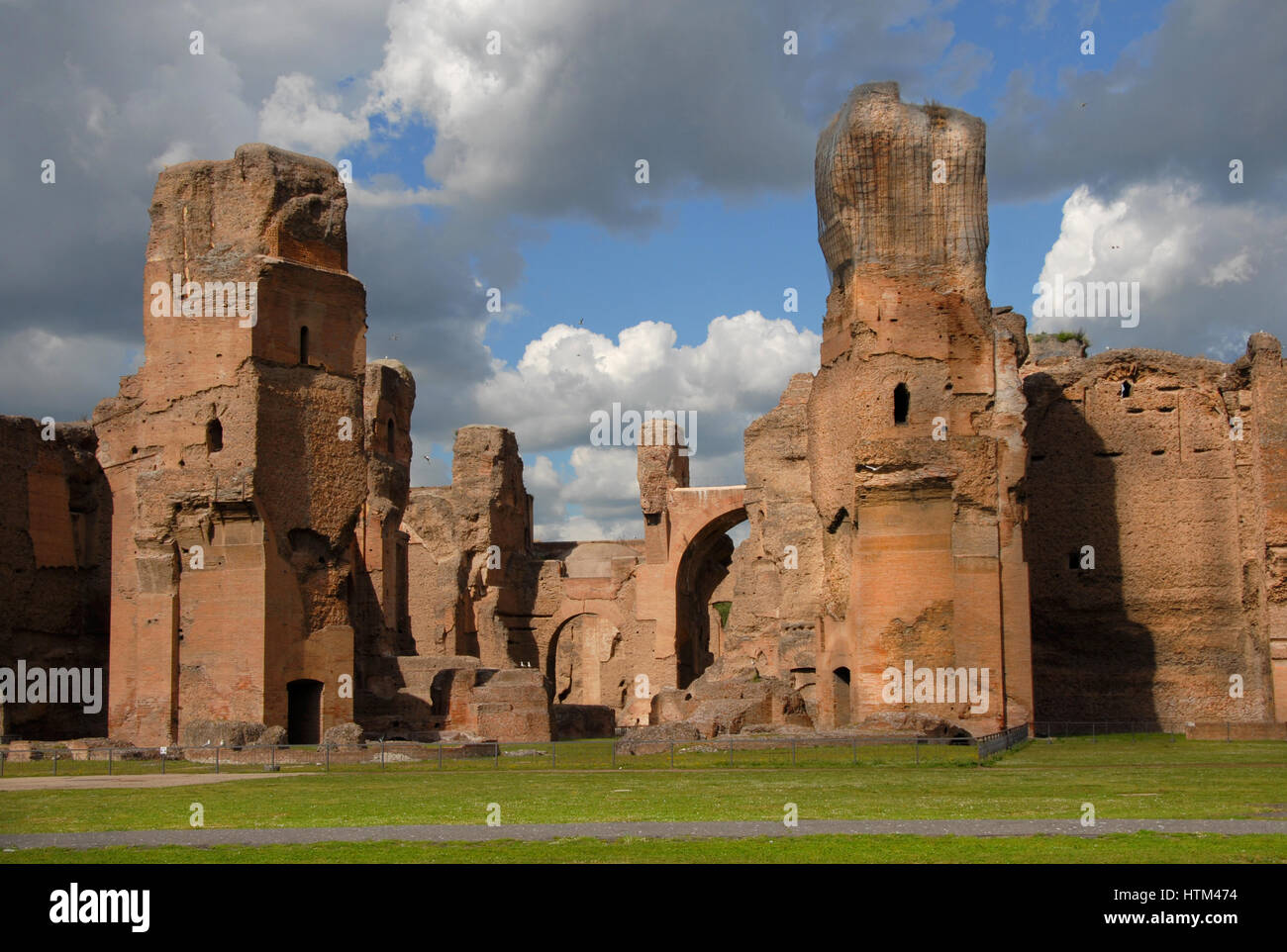 Ancient Baths of Caracalla ruins in the historic center of Rome with beautiful clouds Stock Photo