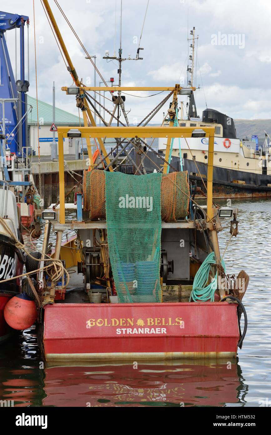 The fishing trawler 'Golden Bells' sitting in Stranraer harbour, Dumfries and Galloway, Scotland, UK Stock Photo