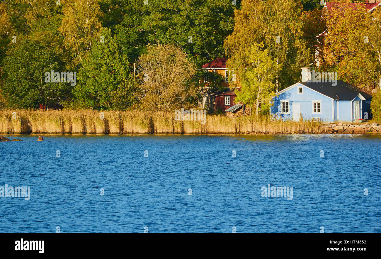 Blue timber waterfront house, Stockholm archipelago, Sweden